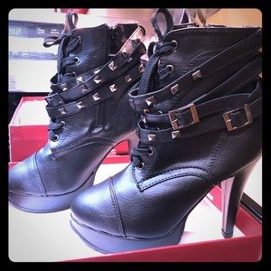 Studded high heeled boots